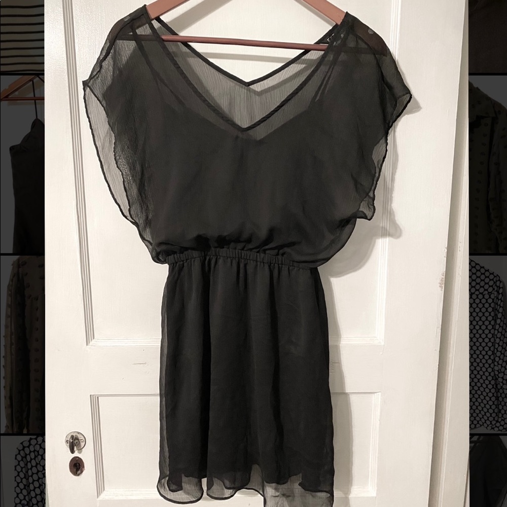 Black sheer dress with attached slip dress.